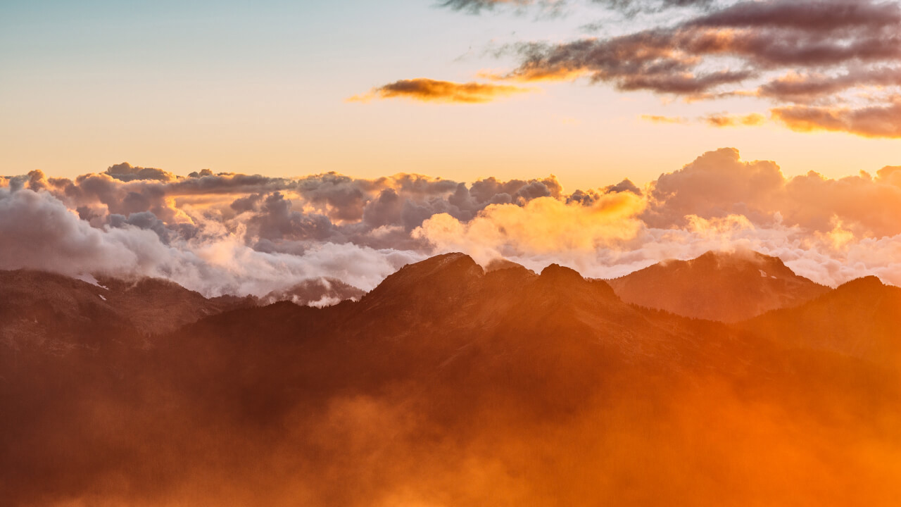 A mountain range during sunset