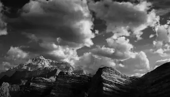 Black and white of clouds and mountain tops