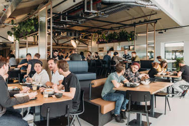 Many Guerrilla team members enjoying lunch in the cafe